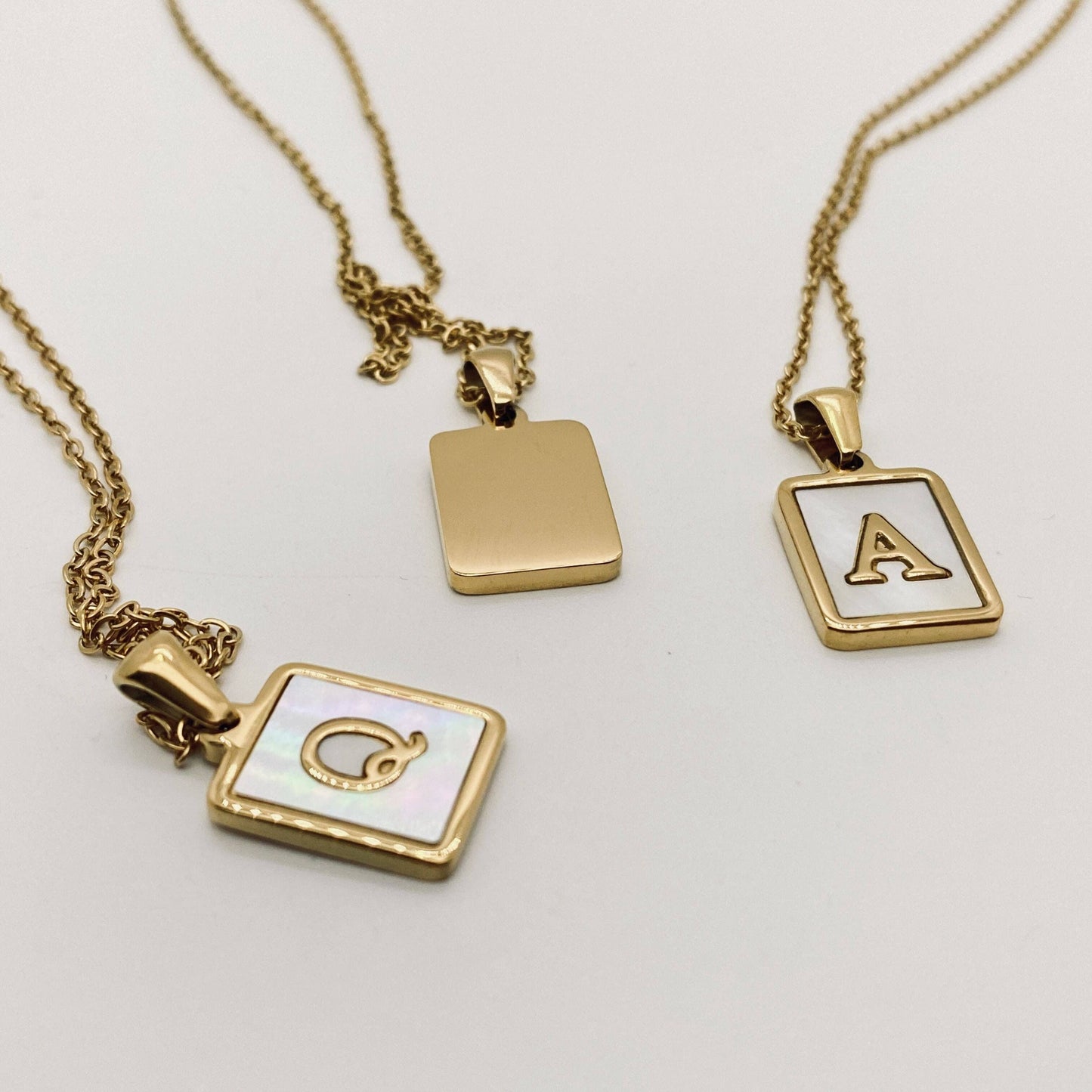 Square Initial Gold Necklace With Mother Of Pearl.